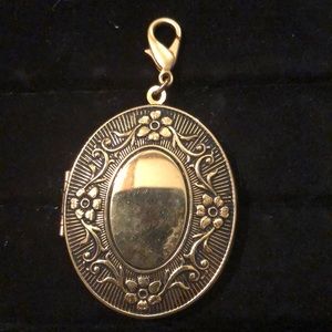Like New Gold/Black Locket